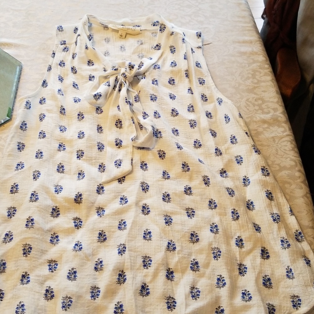 Light floral sleeveless blouse
